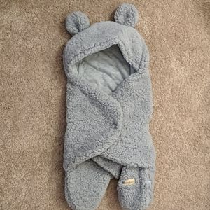 Newborn receiving blanket wrap